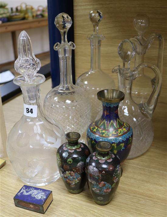 Three Victorian glass decanters, two claret jugs and four pieces of cloisonne